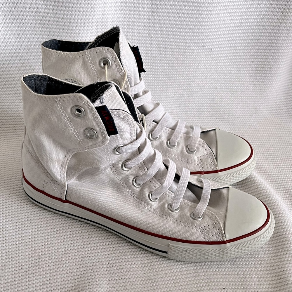 Girls slip on sneakers by “CONVERSE”